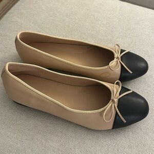 New leather ballet flats. Sand colored with black cap toe and bow. Size 41